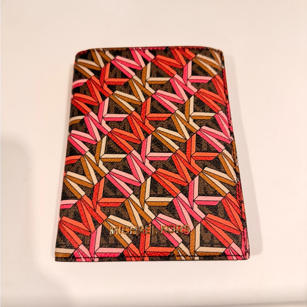 Michael Kors Geometric Logo Passport Holder in Pink, Orange & Brown